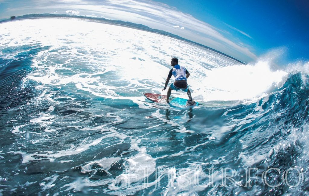 Surfer riding the waves - Surfing