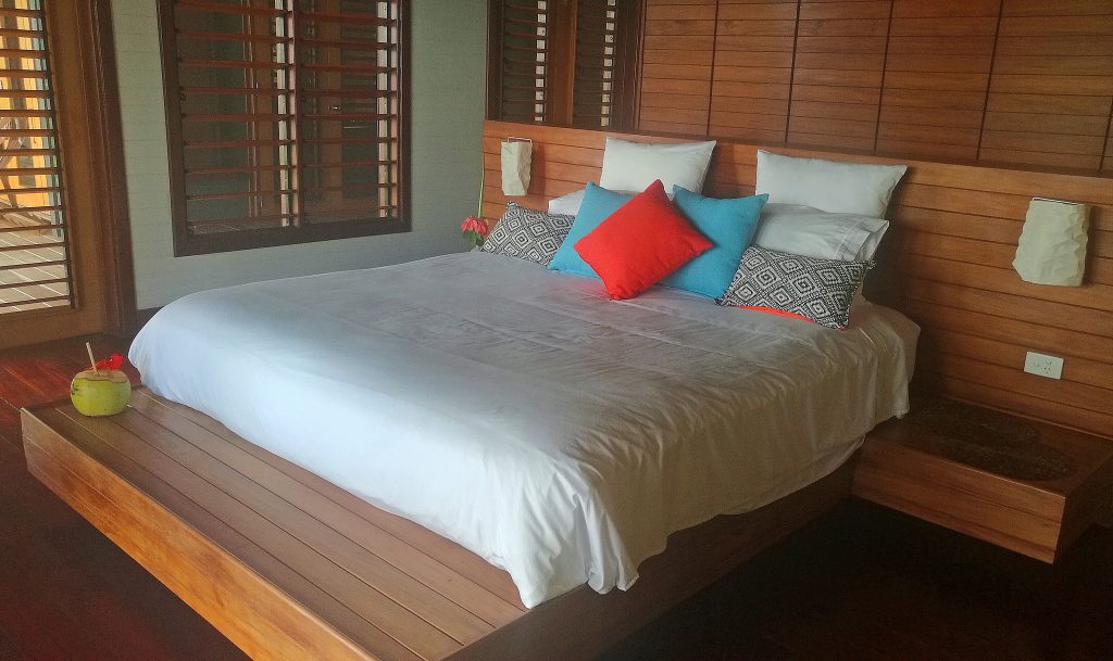 Bedroom at Tavola glows with native hardwoods--not too many Vanua Levu accommodations have this amenity